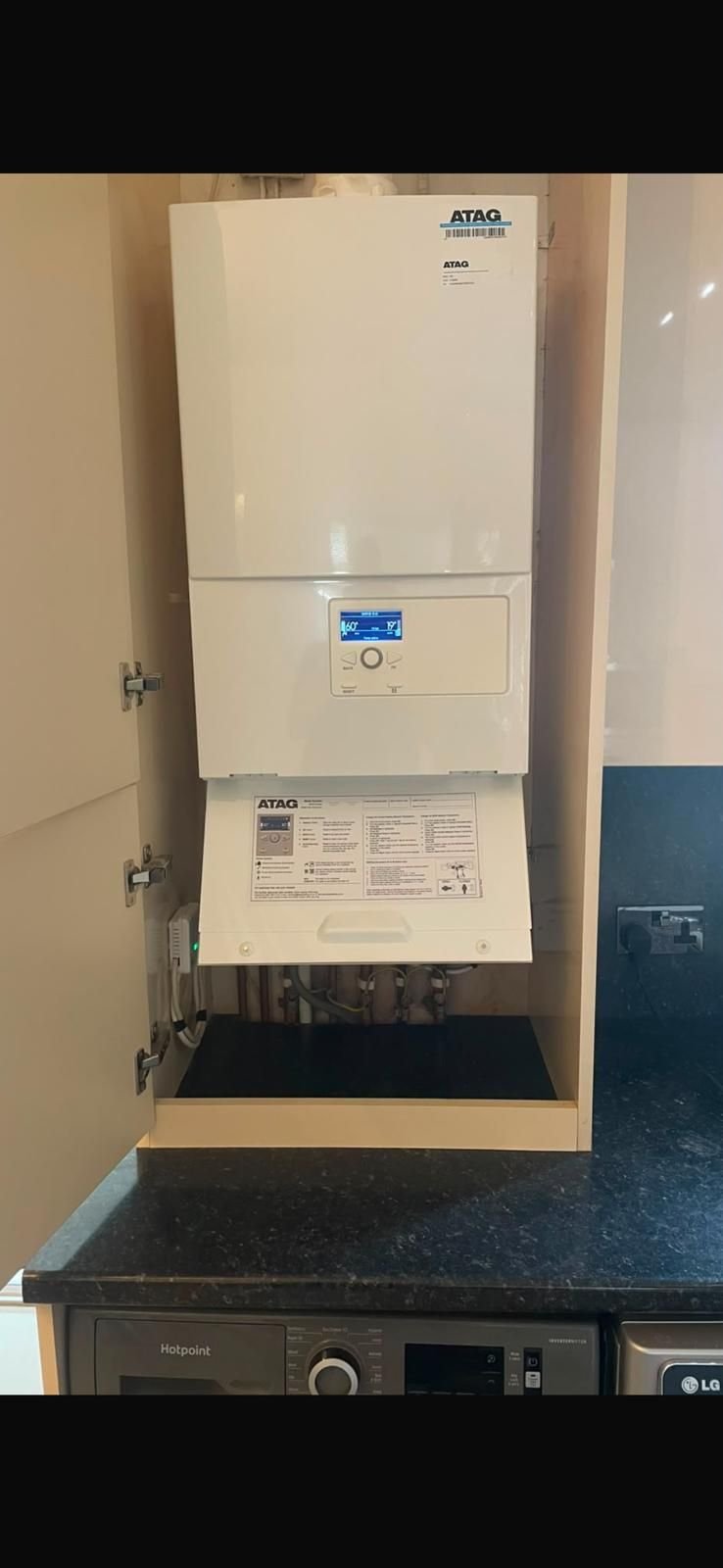 ATAG boiler installed neatly inside a kitchen cupboard by Connected Gas
