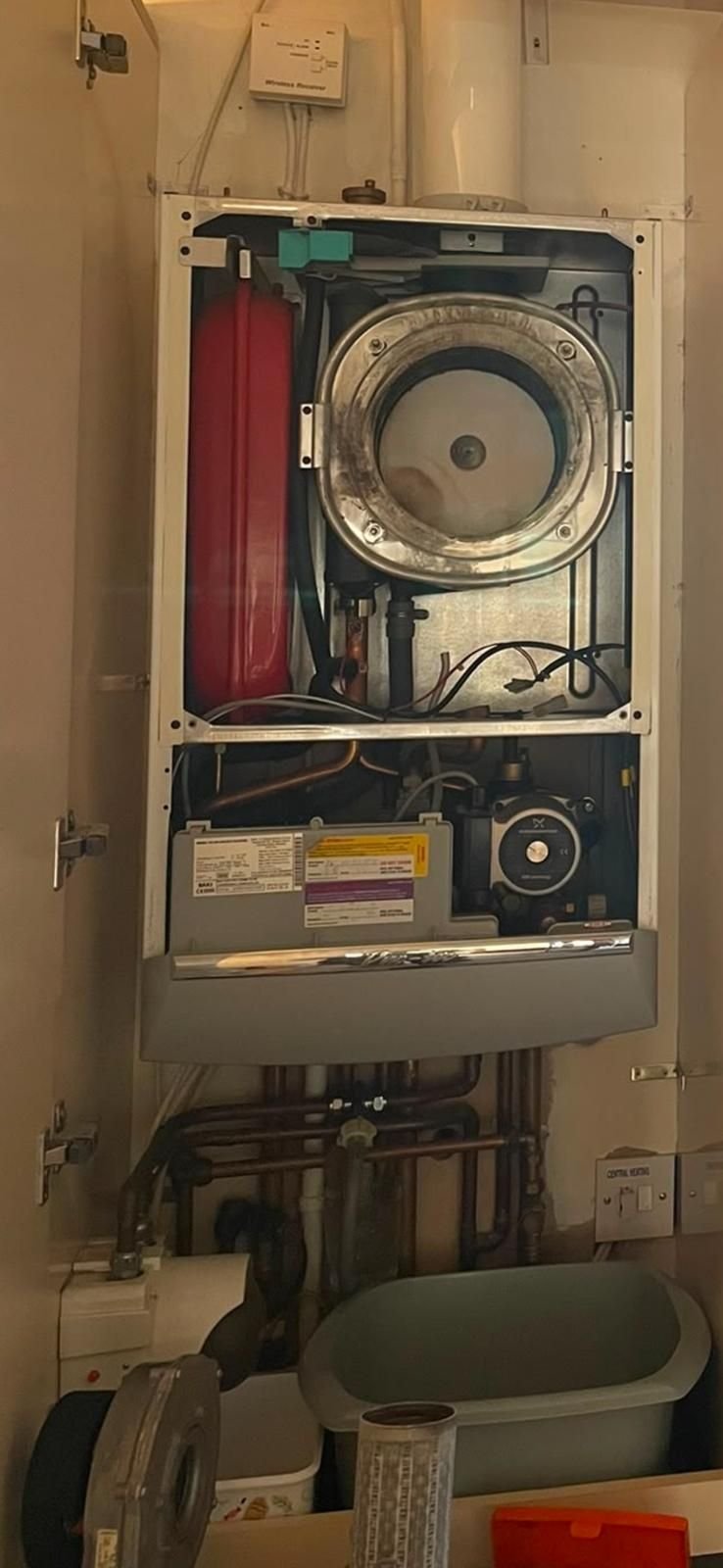 Boiler opened up for repair and servicing by a Gas Safe engineer