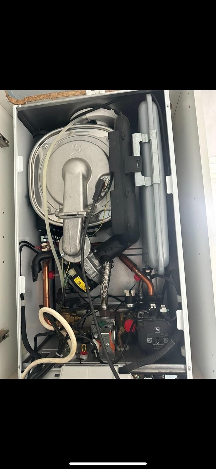 Gas boiler stripped down for a thorough annual service