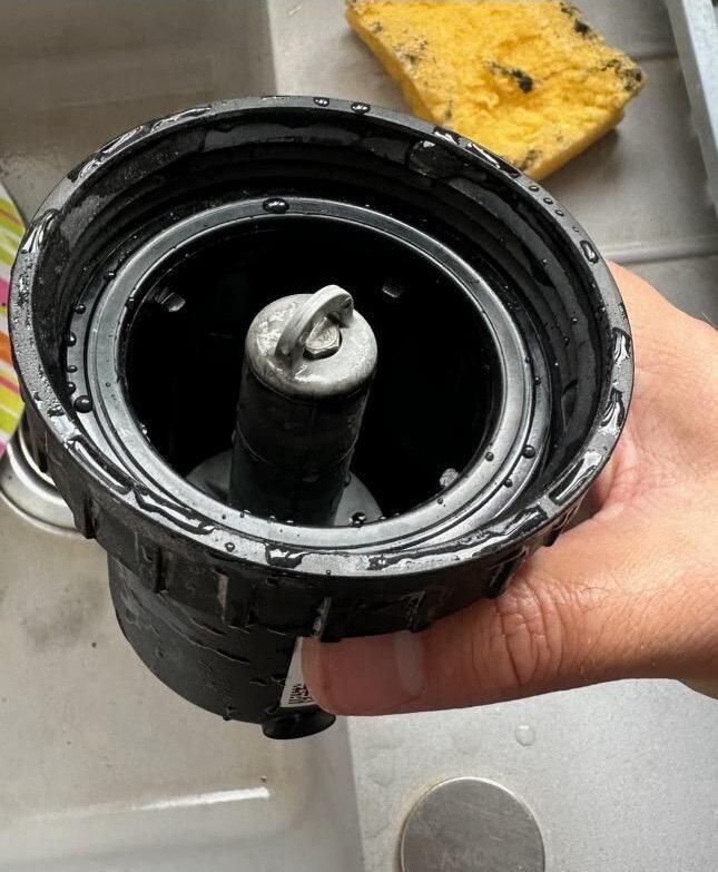 Magnetic filter removed and cleaned during a boiler service
