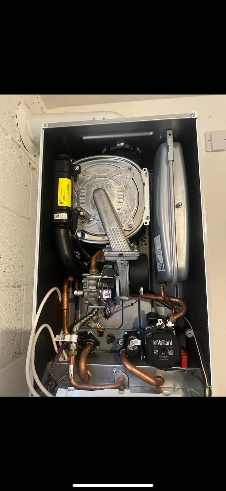 Vaillant boiler opened for annual service inspection