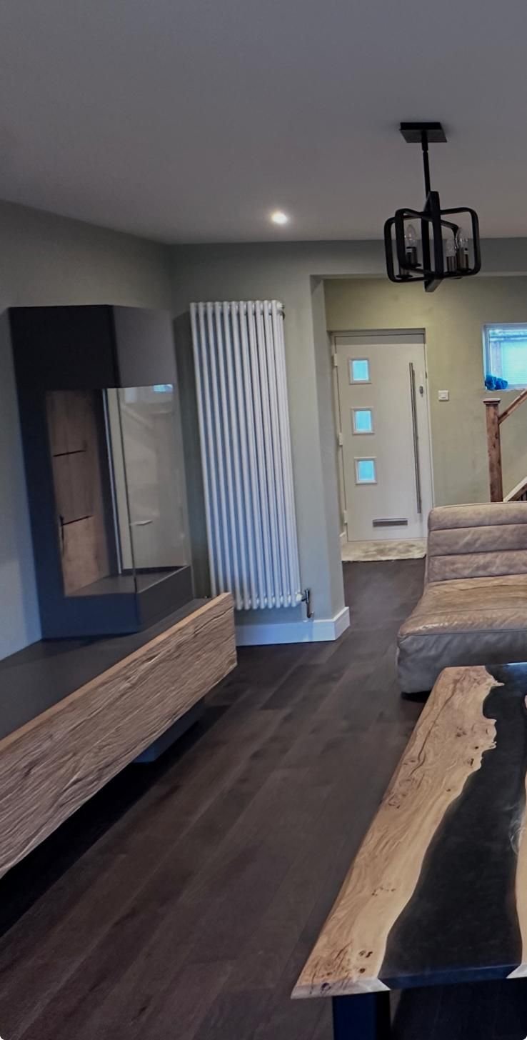 White column radiator installed in a hallway